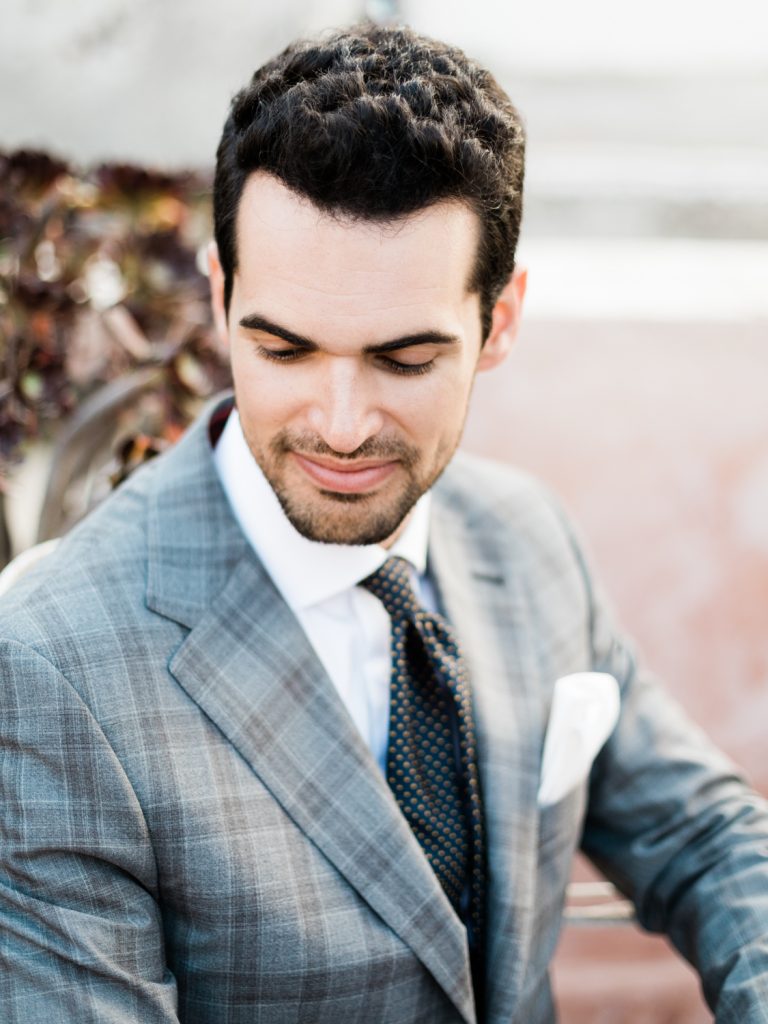 Destination weddings in Santorini. Portrait of the groom.