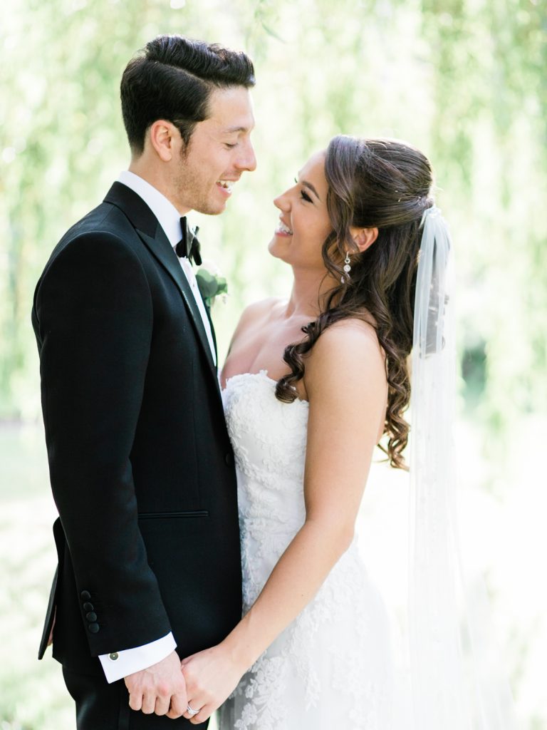 Bride wears an Enzoani gown from Along Came Eve in Chester - photo