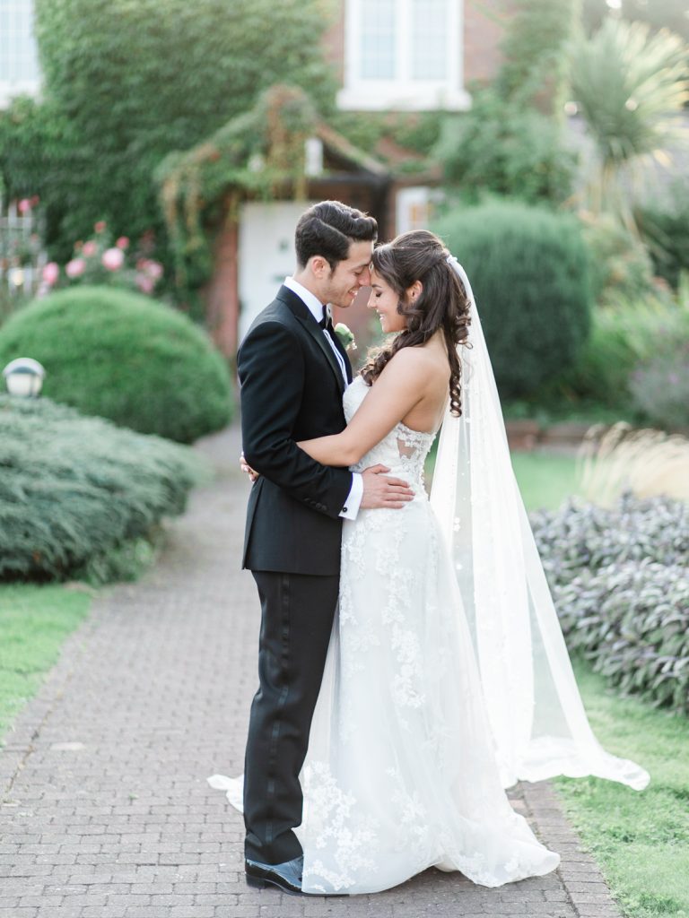 Romantic bride and groom portraits in light and airy style - photo