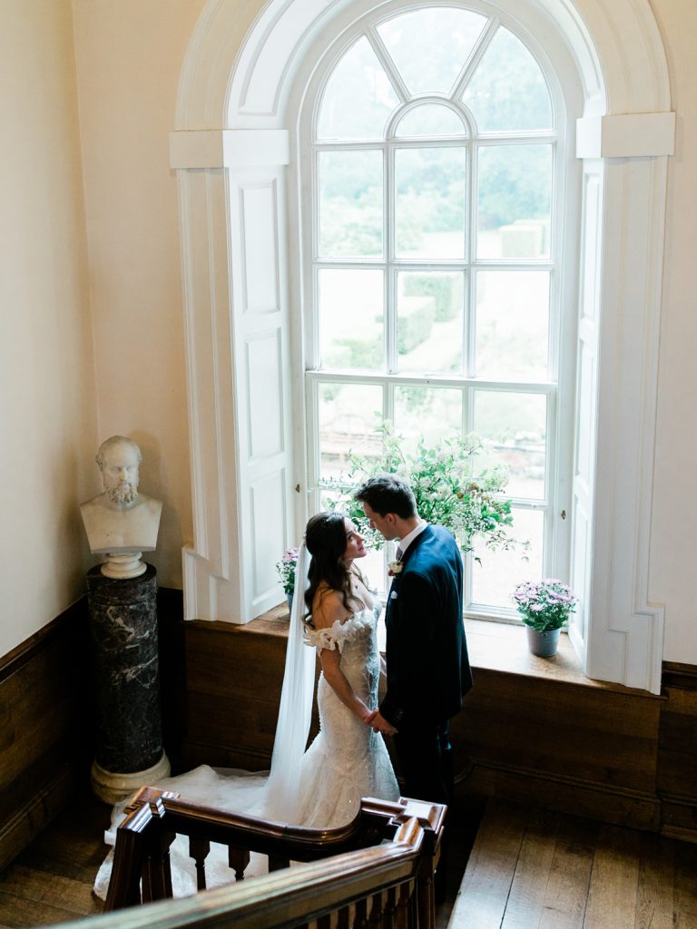 Fine art wedding photography for a rainy summer wedding at Iscoyd Park.