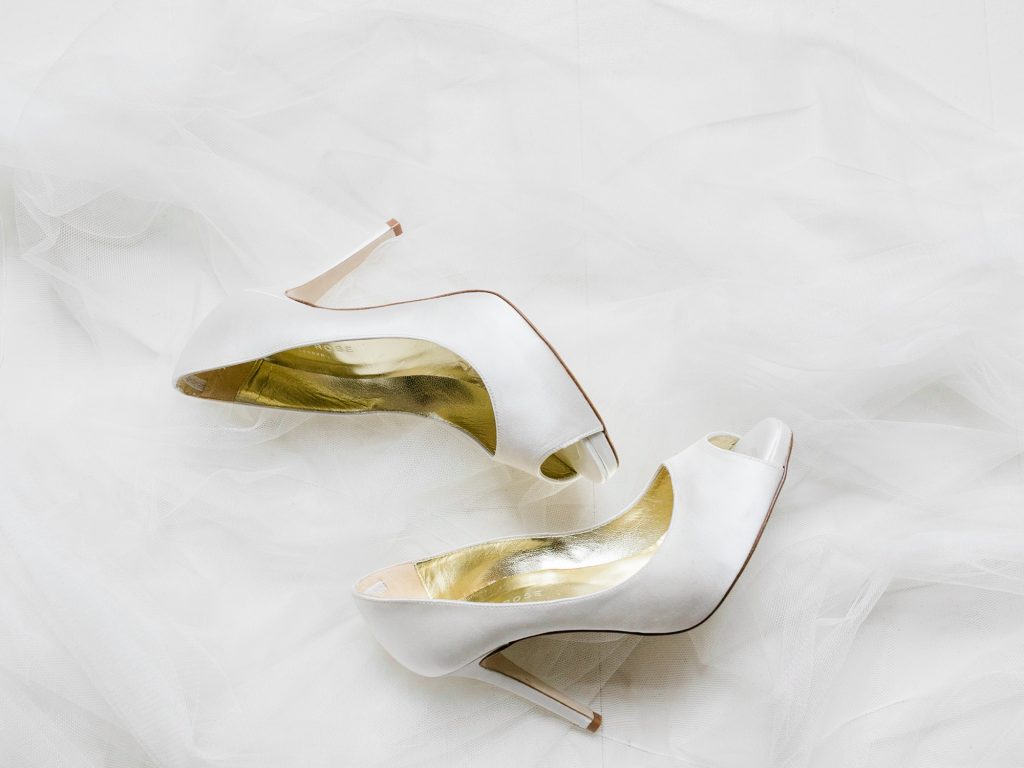 Fine art wedding photography featuring wedding shoe details.