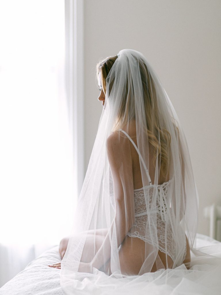 Light and airy feminine boudoir photography.