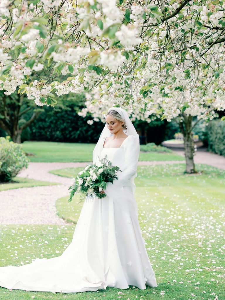 Bride Jess in the gardens at Hawkstone Hall