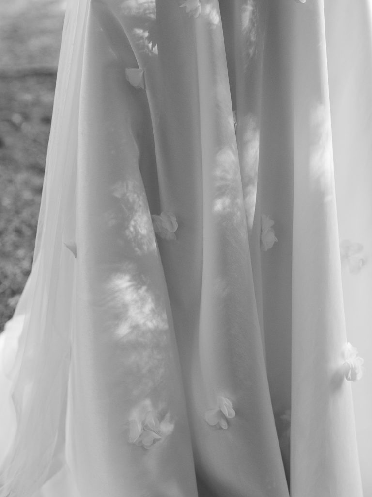 Close up shot of Jess' beautiful veil and dress