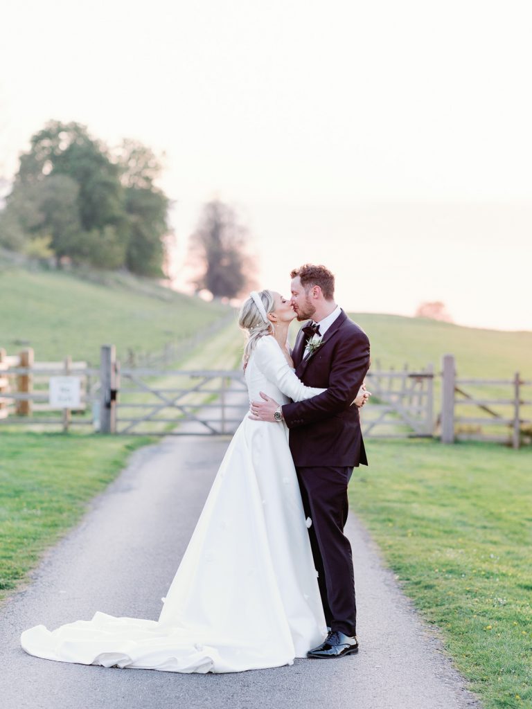 Early evening portrait of couple in the gardens of Hawkstone Hall