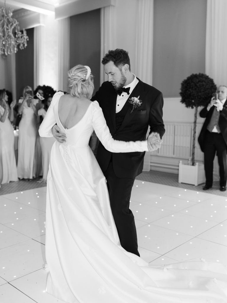 First dance fun captured in black and white.