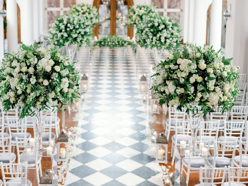 The Chapel at Hawsktone Hall all dressed up before the wedding ceremony. Flowers by Red Floral