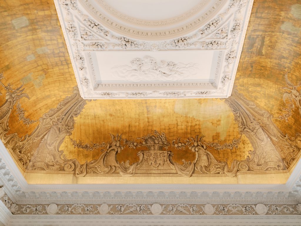 Detail shot of the venue's cornicing and painted ceiling