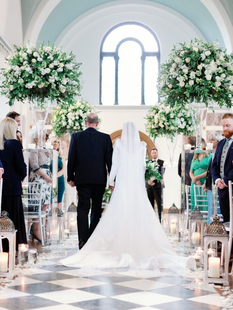 Bride walking down the aisle, captured from behind