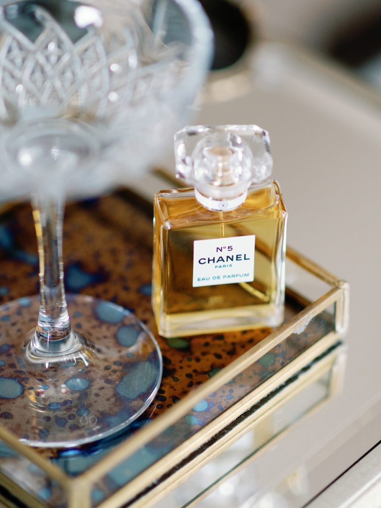 Detail shot of bride's perfume bottle