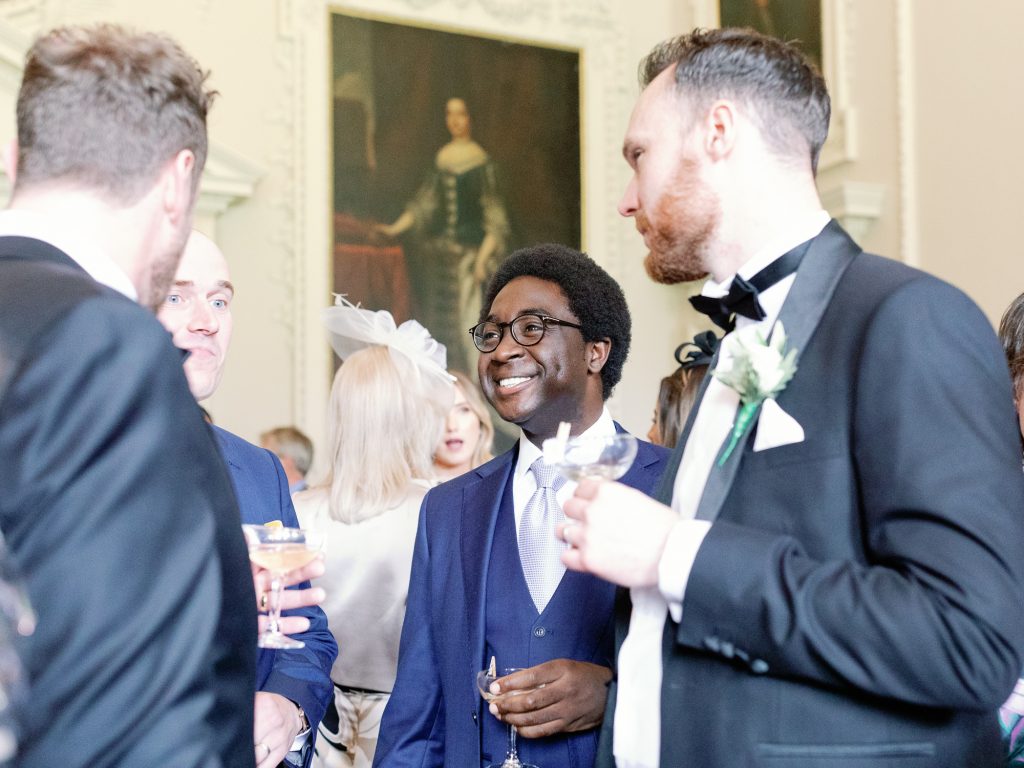 Guests mingling during the drinks reception in the Winter Garden