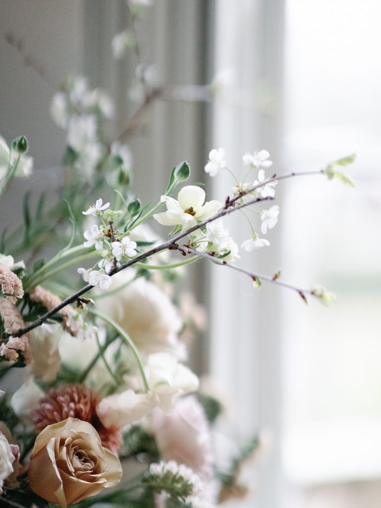Detail shot of the venue floral installation, featuring seasonal blossom.