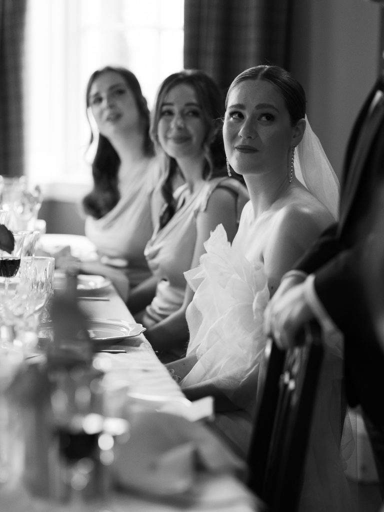 Else looks up adoringly at Rory during his speech.