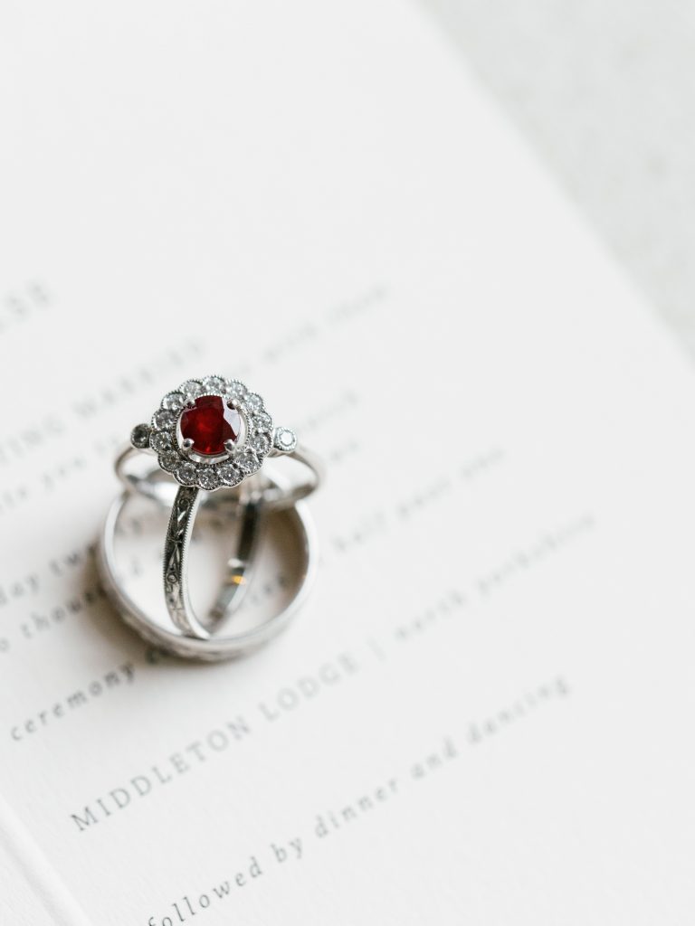 Detail shot of Else's engagement ring and two wedding bands.