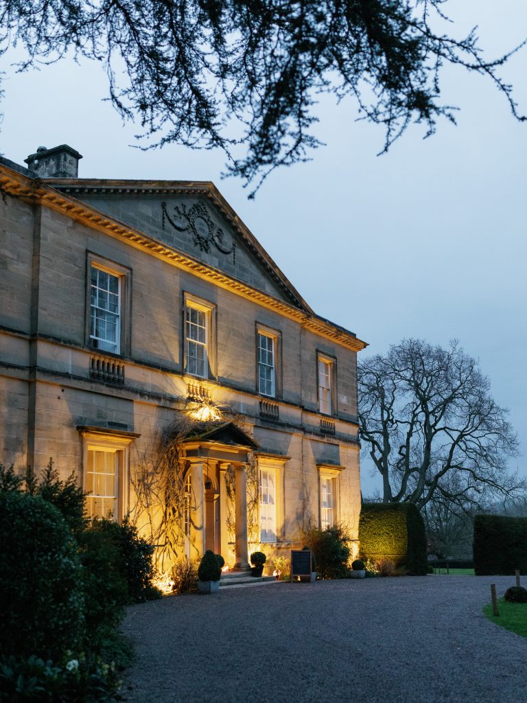 Exterior shot of Middleton Lodge at dusk.