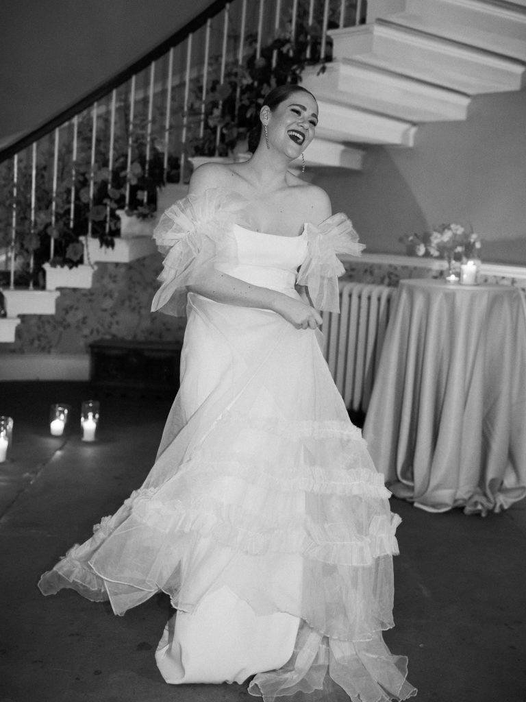 Else dancing in her beautiful tulle Halfpenny London gown, captured in black and white.